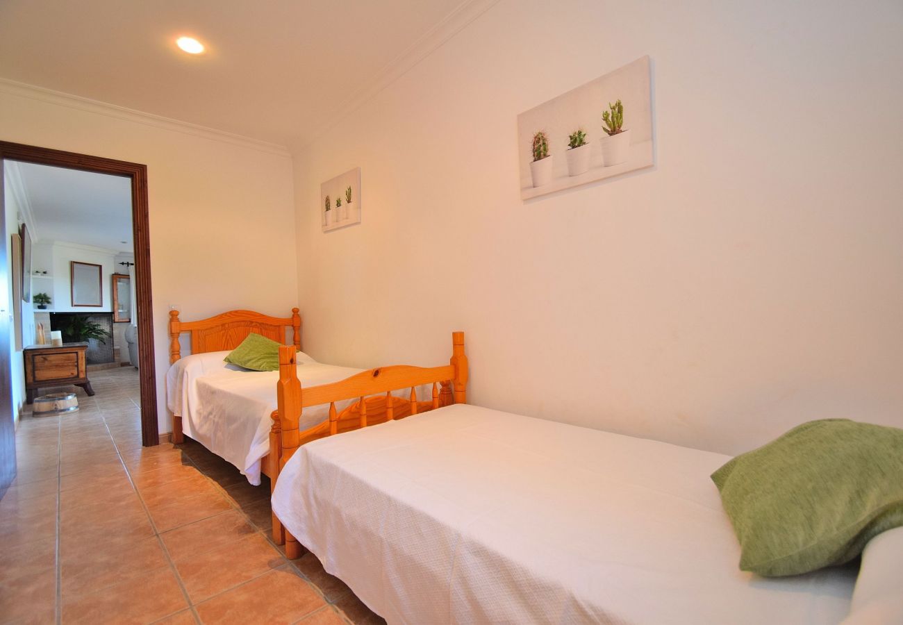 Room with two beds from the villa in Sineu